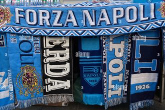 napoli football club scarves for sale from a stall in central naples PXR8JR